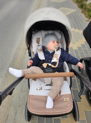 Beżowa wkładka do wózka w misie, pasująca do większości modeli wózków