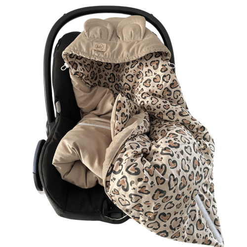 beżowy otulacz do fotelika w panterkę